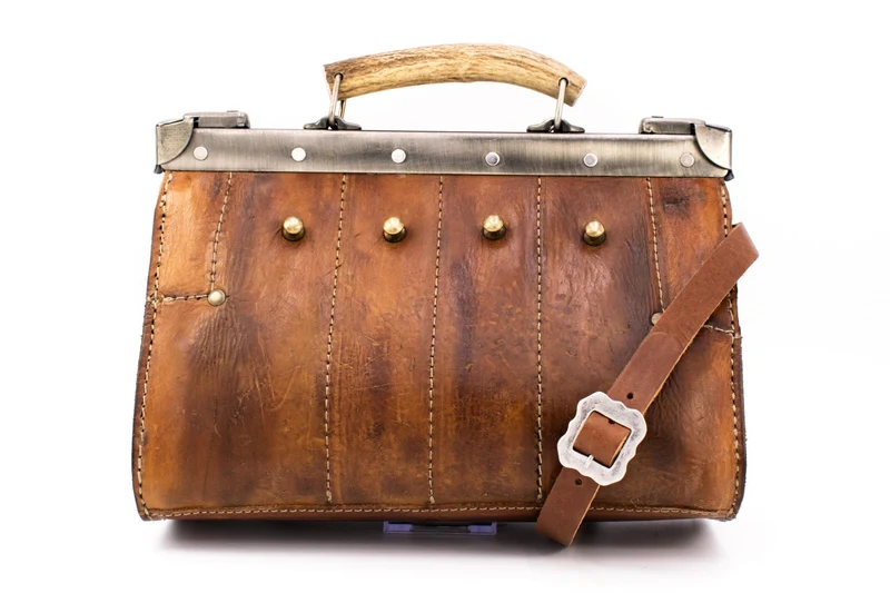 Doctor's bag made of antique material in brown with sailcloth and staghorn handle
