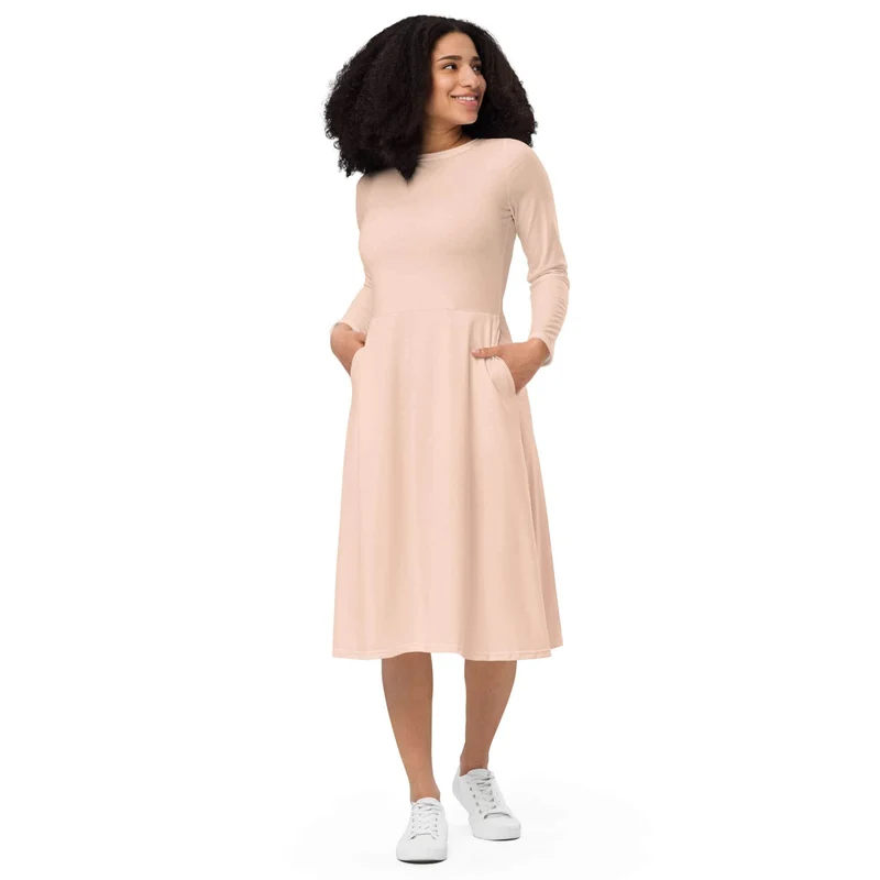Peach Midi Dress with Pockets: Soft Elegance and Everyday Comfort.